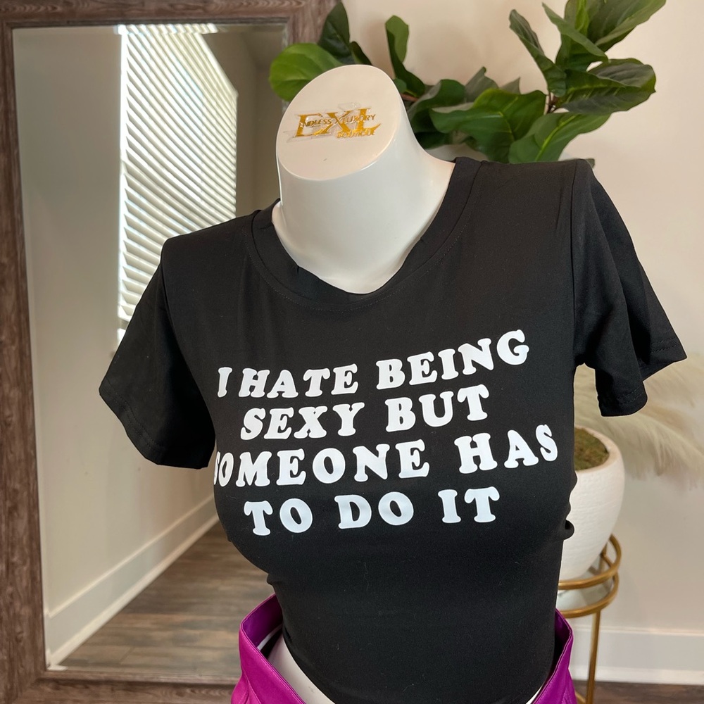 Black crop top with white writing